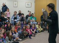 Jeanne and Silo, the barn owl, at the Wallingford Library.